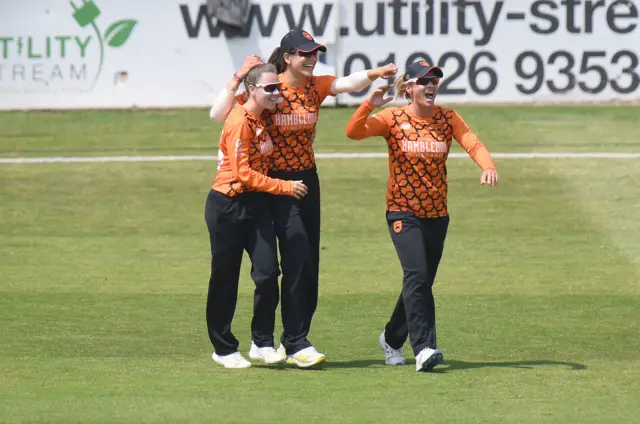 Southern Vipers players Linsey Smith, Maia Bouchier and Danni Wyatt celebrate a wicket