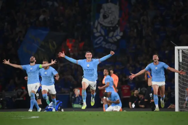 Man City players celebrate