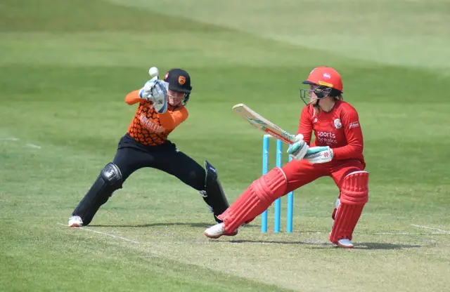 Thunder's Ellie Threlkeld attempts a scoop