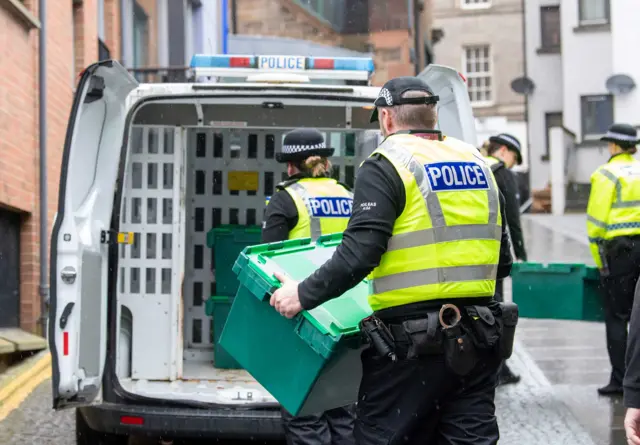 Police at the SNP headquarters