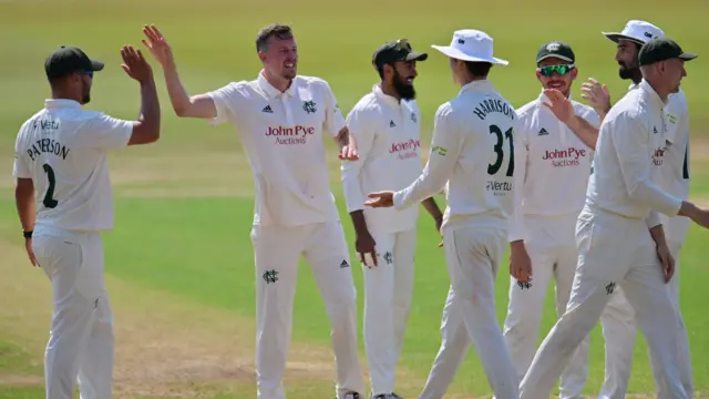 Jake Ball celebrates wicket