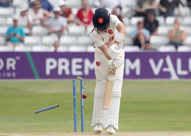 Essex's Ben Allison is bowled by Craig Overton of Somerset