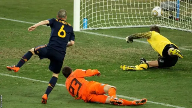 Andres Iniesta scores for Spain against the Netherlands