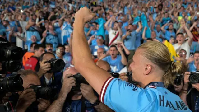 Erling Haaland celebrates Man City's Champions League win