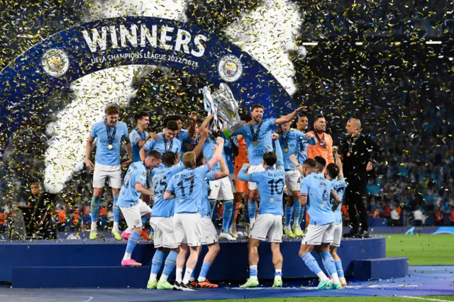 Man City lift the Champions League trophy