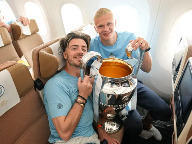 Jack Grealish and Erling Haaland