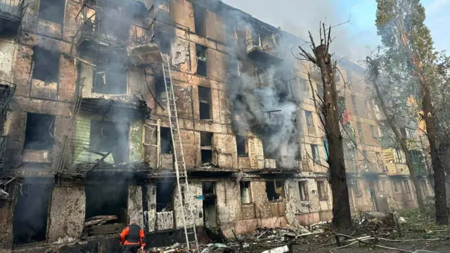 A view shows a residential building heavily damaged by a Russian missile strike, amid Russia's attack on Ukraine, in Kryvyi Rih