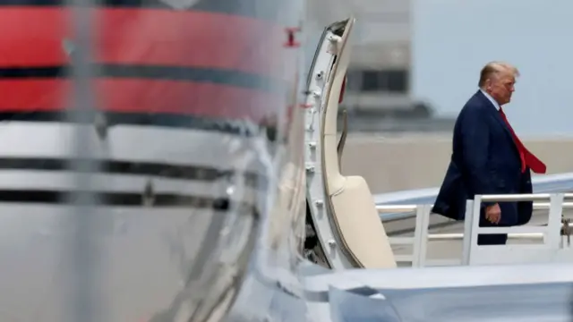 Donald Trump arrives at the Miami International Airport on Monday