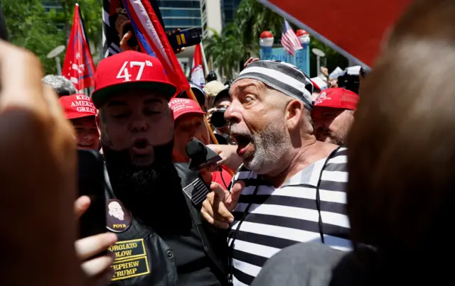 Supporters and anti-Trump protestors faced off outside a courthouse in Miami where former president Trump was due to be arraigned