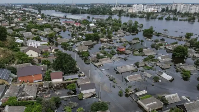 An aerial view of flooded homes in the city of Kherson