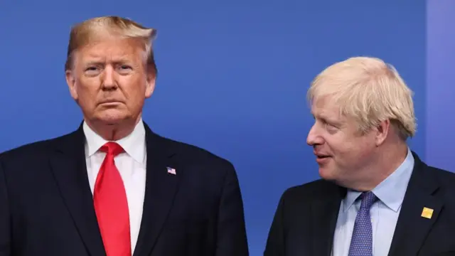 Donald Trump and Boris Johnson standing together