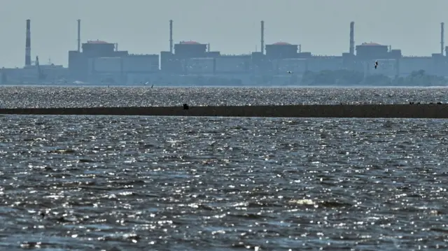 A view shows Zaporizhzhia Nuclear Power Plant from the bank of Kakhovka Reservoir near the town of Nikopol