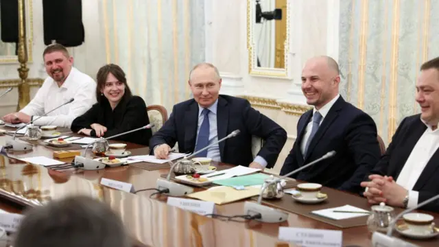 Putin with war correspondents