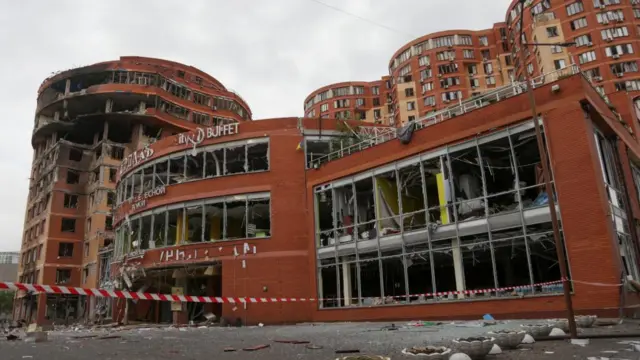 A shopping mall, office and apartment buildings damaged by a Russian missile strike in Odesa