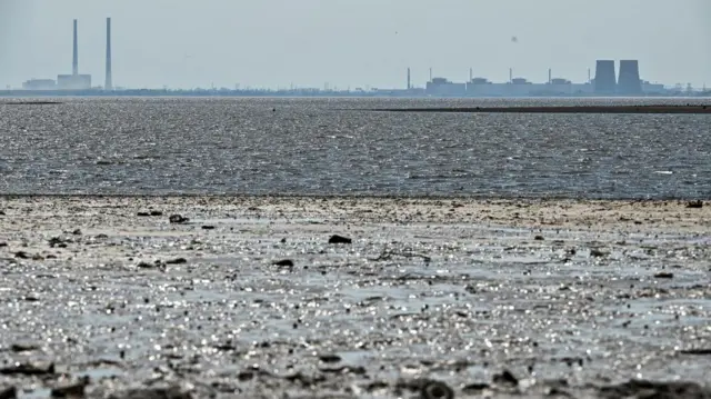 The Zaporizhzhia nuclear power plant viewed across a reservoir