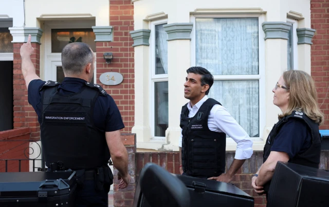 Rishi Sunak on an immigration raid in north-west London on 15 June