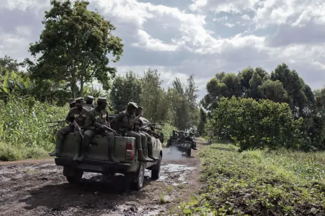 M23 soldiers leave leave Rumangabo camp after the meeting between EACRF officials and M23 rebels during the handover ceremony at Rumangabo camp in eastern Democratic Republic of Congo on January 6, 2023.