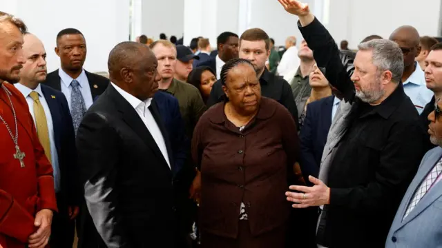 South African President Cyril Ramaphosa (2nd L), Naledi Pandor, South African Minister of International Relations and Cooperation, Ukraine's Prosecutor General Andriy Kostin and President of the Union of Comoros Azali Assoumani visit a church at a site of a mass grave, in the town of Bucha, amid Russia's attack on Ukraine, outside of Kyiv, Ukraine June 16, 2023.