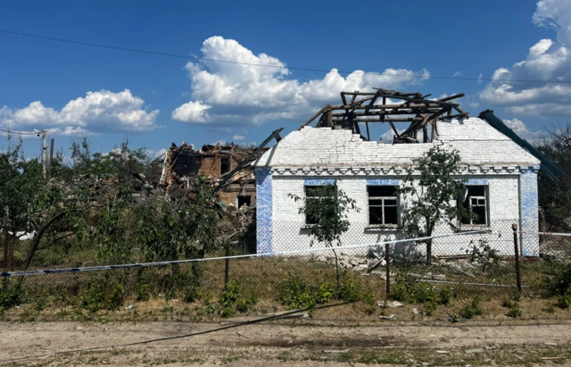 Another house can be seen damaged in the town of Stari Petrivtsi