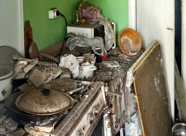 Damage in the kitchen of a house in Stari Petrivtsi