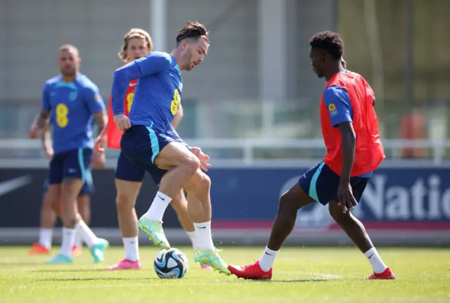 Jack Grealish and Bukayo Saka