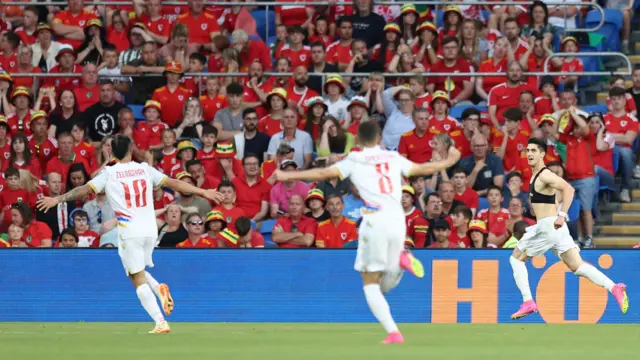 Armenia celebrate their third goal