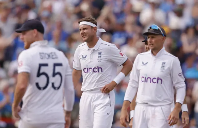 England's Stuart Broad reacts after bowling out Australia's Usman Khawaja with a no ball