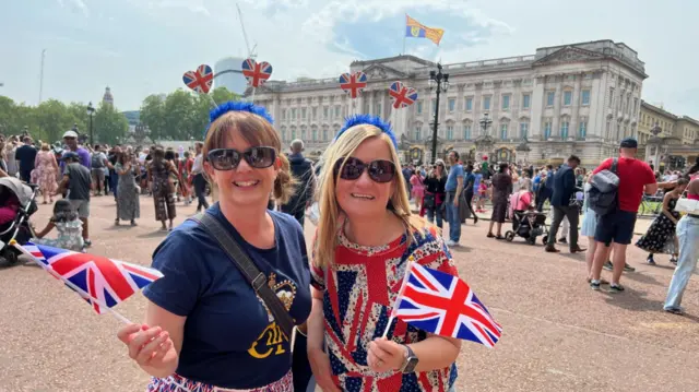 Katy and Leanne McKay outside Buckingham Palace