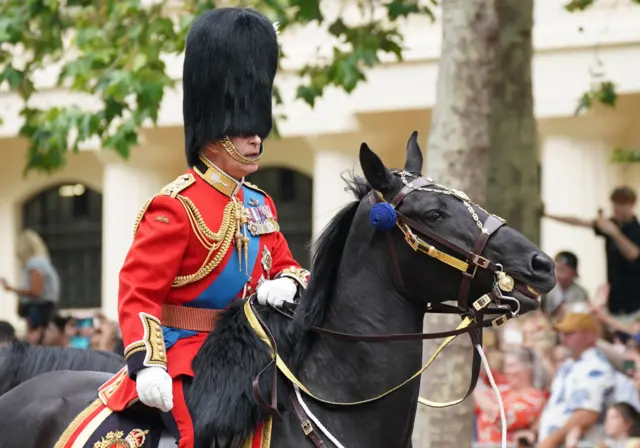 King Charles III rides horse during King's Birthday Parade