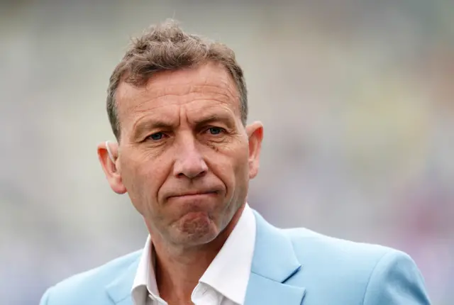 Michael Atherton wearing a blue blazer