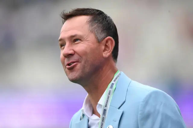 Ricky Ponting wearing a blue blazer