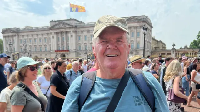 Tony Langridge, 63, from Queensland, Australia outside Buckingham Place