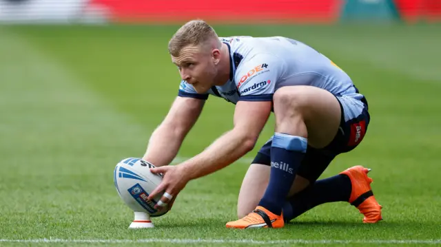 Joey Lussick prepares to kick