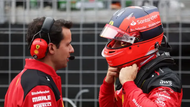 Charles Leclerc wearing his Gilles Villeneuve tribute helmet