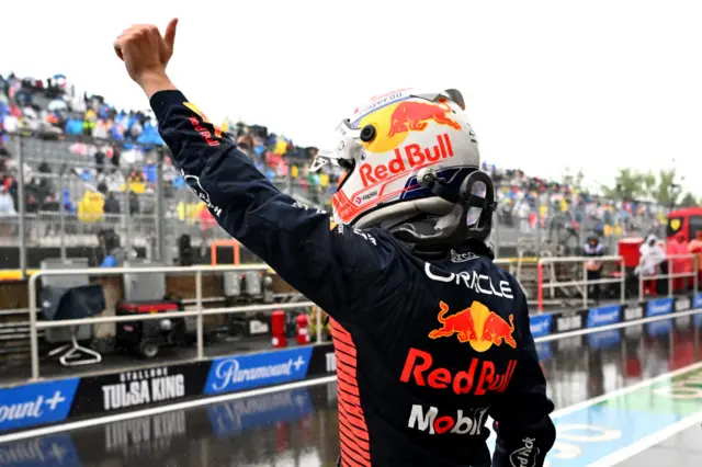 Max Verstappen waves to the crowd after securing pole position for the Canadian Grand Prix