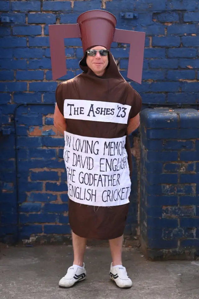 An England fan dressed as the Ashes urn