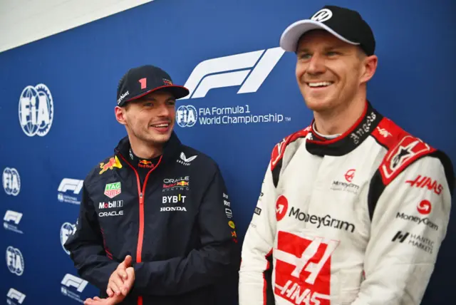 Max Verstappen and Nico Hulkenberg smile after qualifying