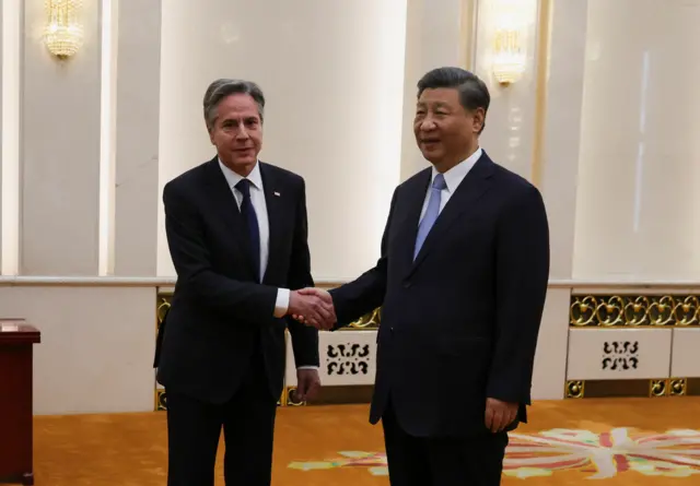 Blinken and Xi shake hands as they meet in the Great Hall of the People