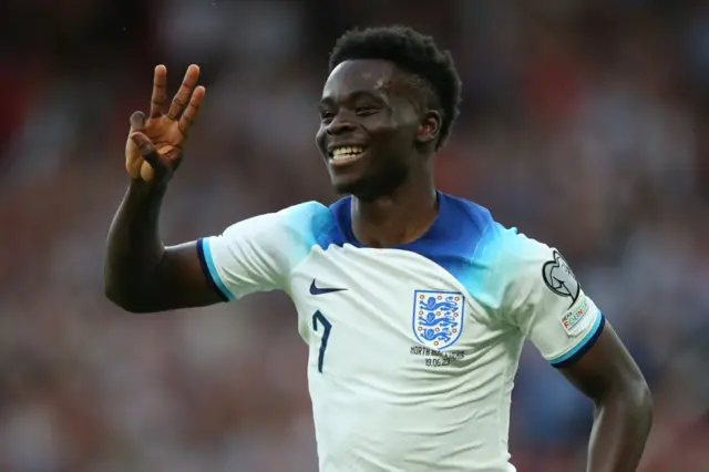 Bukayo Saka celebrates scoring a hat-trick for England against North Macedonia in Euro 2024 qualifying