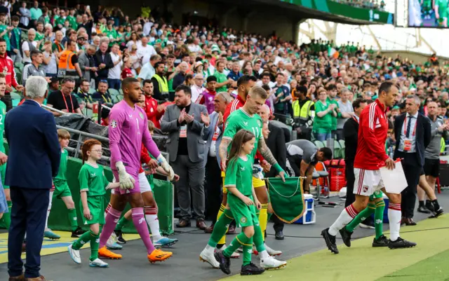 James McClean leads the Republic of Ireland out as captain against Gibraltar