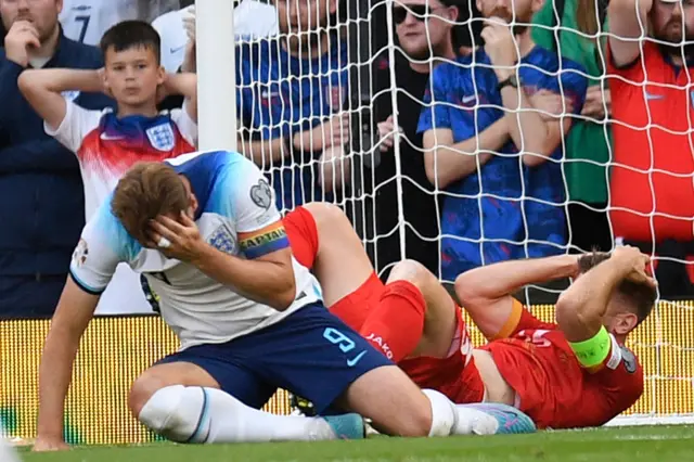 Harry Kane clutches his head during England's Euro 2024 qualifier with North Macedonia at Old Trafford