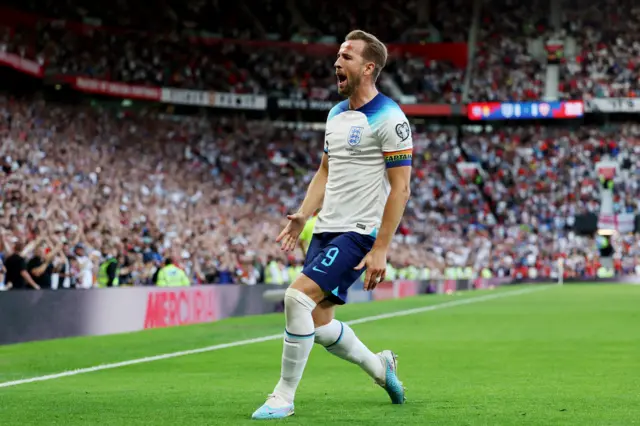 Harry Kane celebrates scoring in England's Euro 2024 qualifier against North Macedonia at Old Trafford