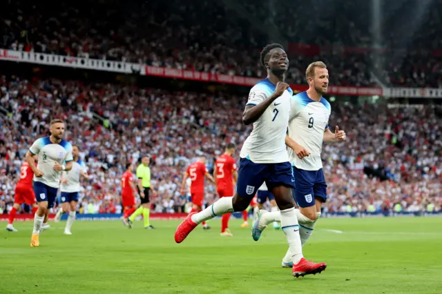 Bukayo Saka celebrates a goal