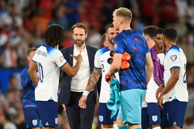 Gareth Southgate and his England players celebrate after beating North Macedonia 7-0 in Euro 2024 qualifying