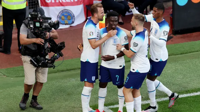 Saka celebrates his hat-trick