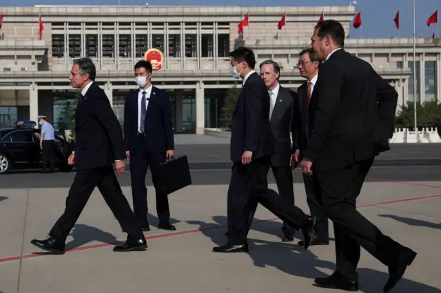 US Secretary of State Antony Blinken walks after arriving in Beijing, China, June 18, 2023.