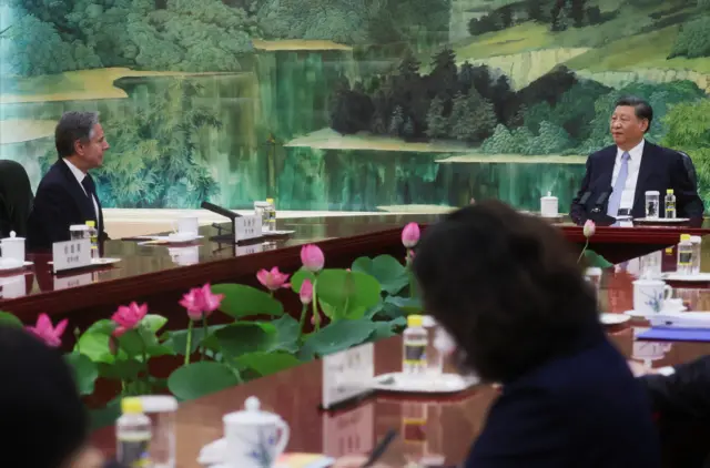 Blinken and Xi shake hands as they meet in the Great Hall of the People