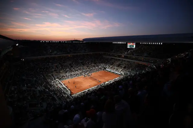 Wide shot of Court Philippe Chatrier at night
