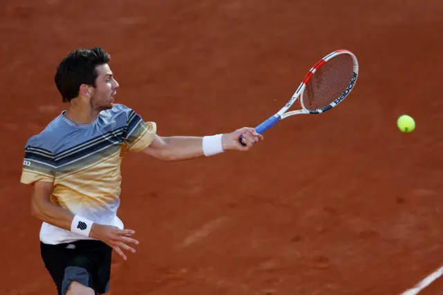 Cameron Norrie hits forehand