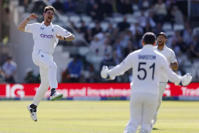 Josh Tongue celebrates his first Test wicket